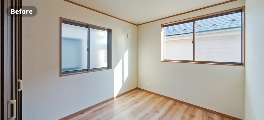 寝室のステージングビフォー画像　家具の置かれていないフローリングの６畳程度の個室